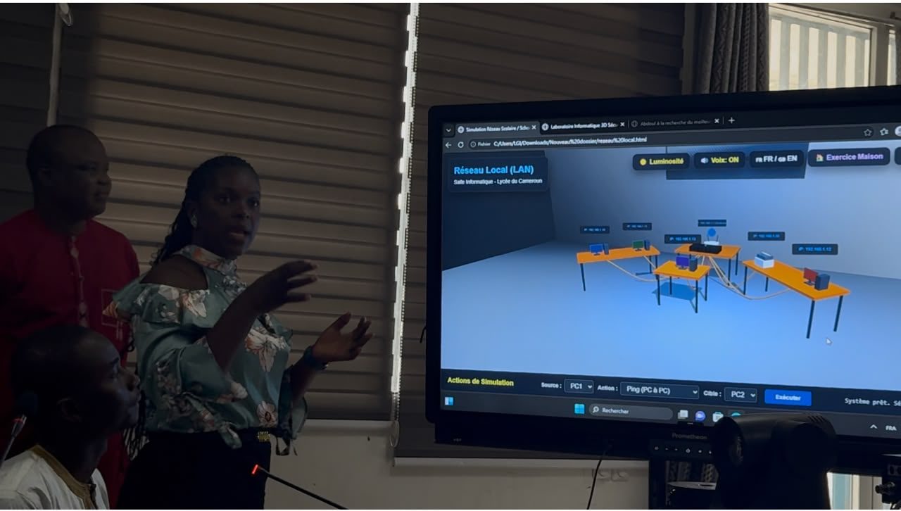 A teacher presents a local-area network, titled for a Cameroon school computer room.