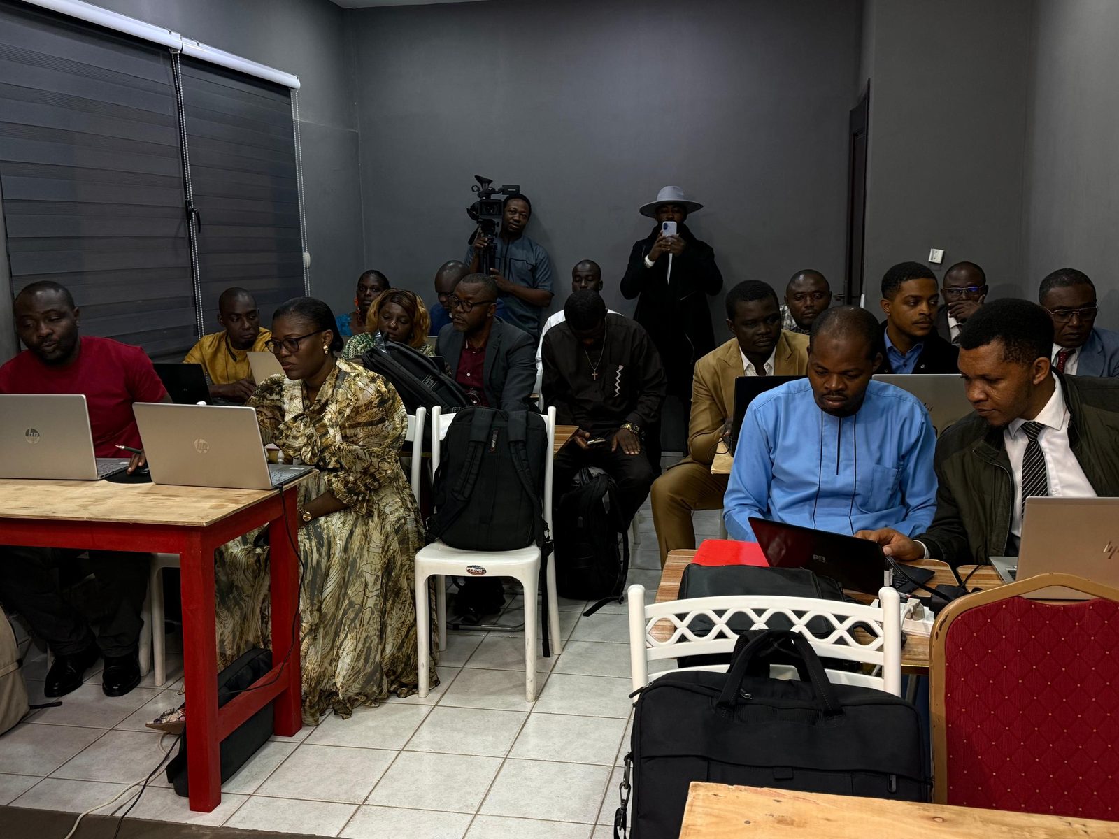 Participants at laptops during the training.