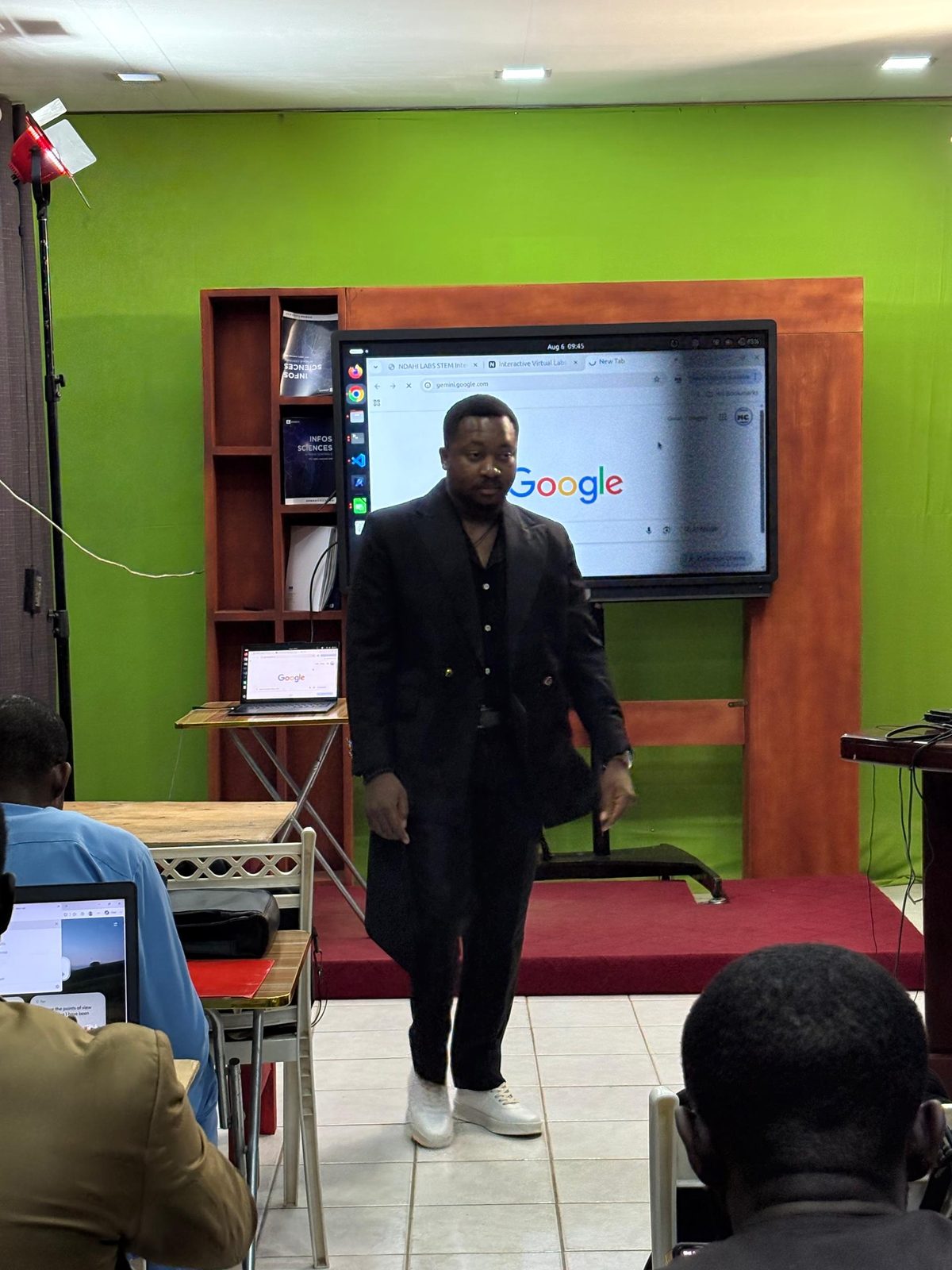 The screen in that room. The clock reads 6 August 2026, 09:45. A browser tab is titled NDAHI-LABS SYSTEM.